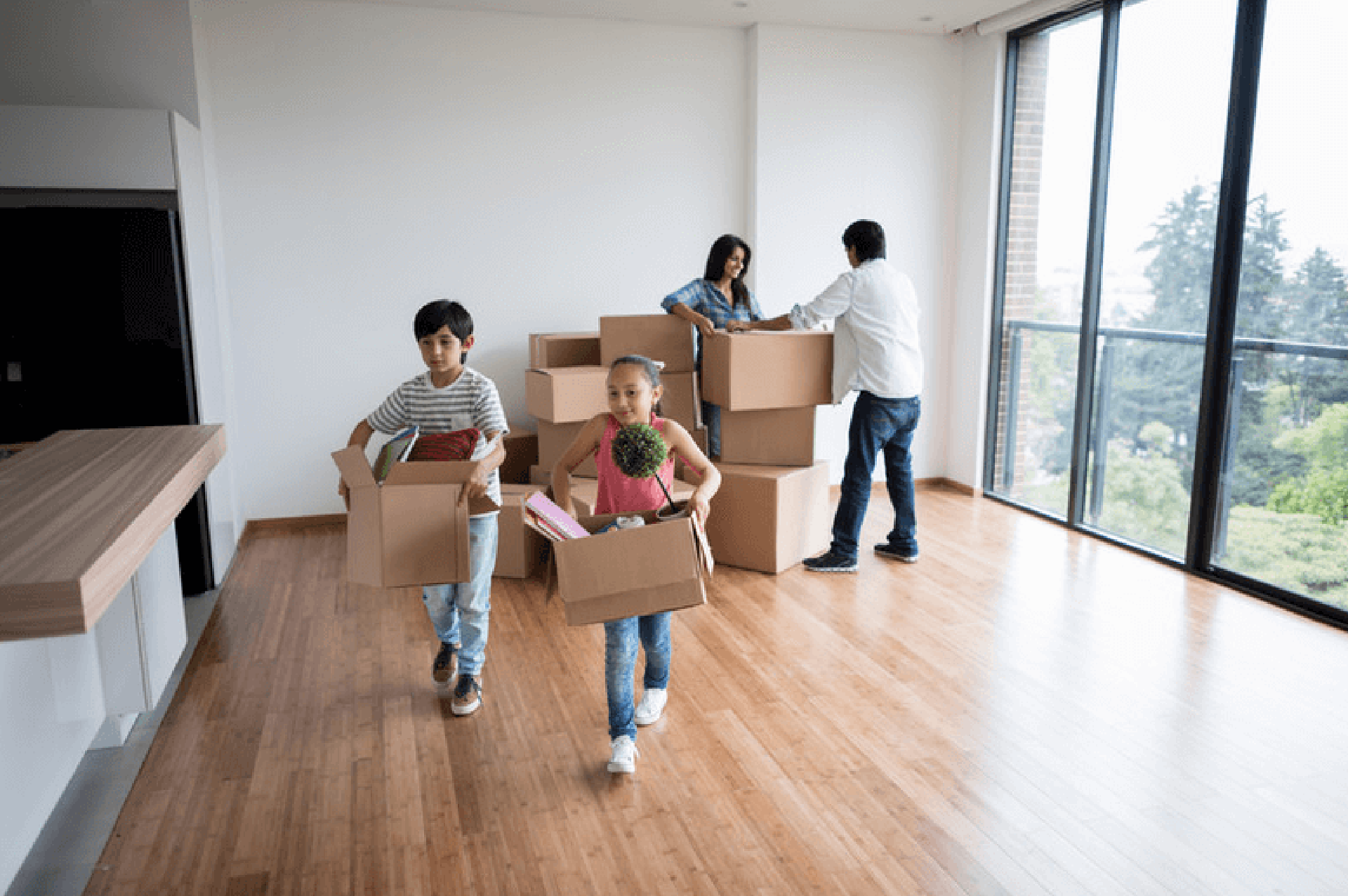 Beautifully family moving into their newly bought and freshly painted home